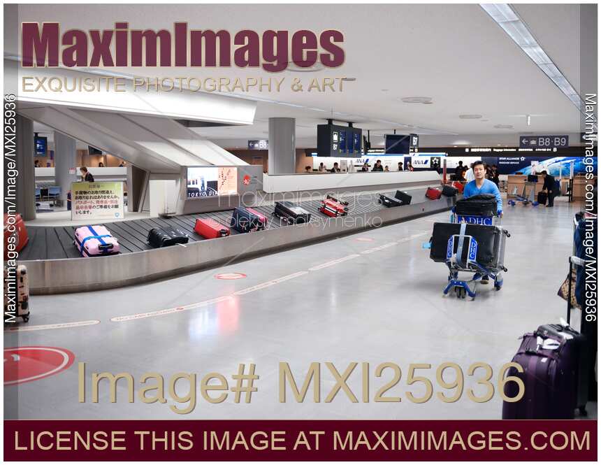 People at baggage claim of Narita International airport Japan