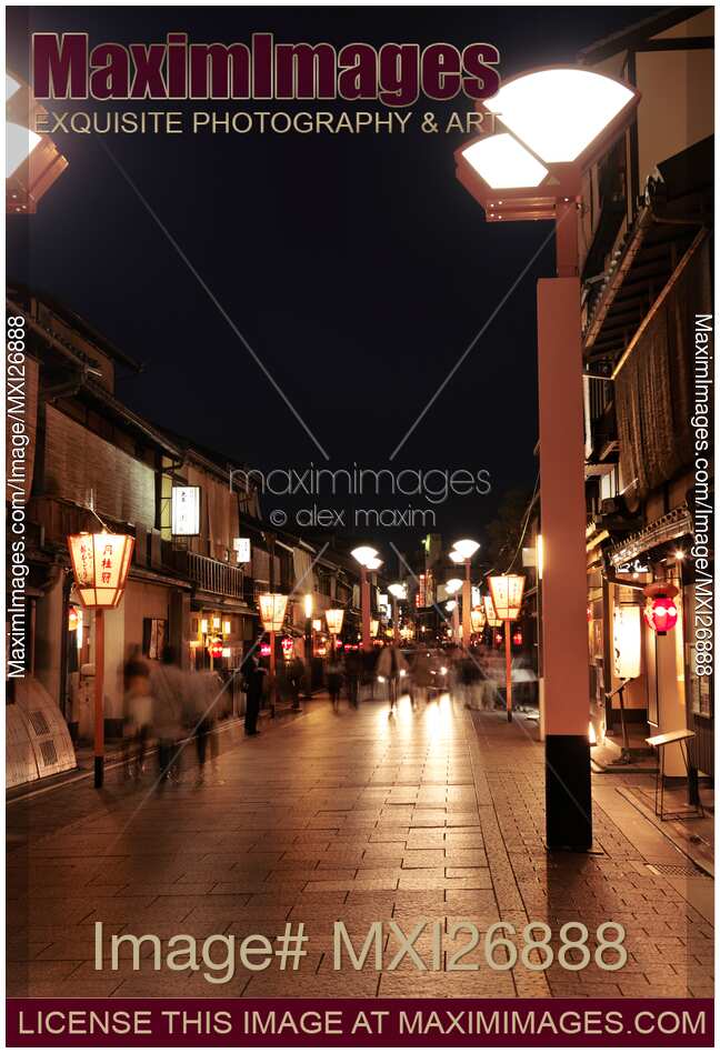 People at Hanami-koji dori street in Kyoto at night