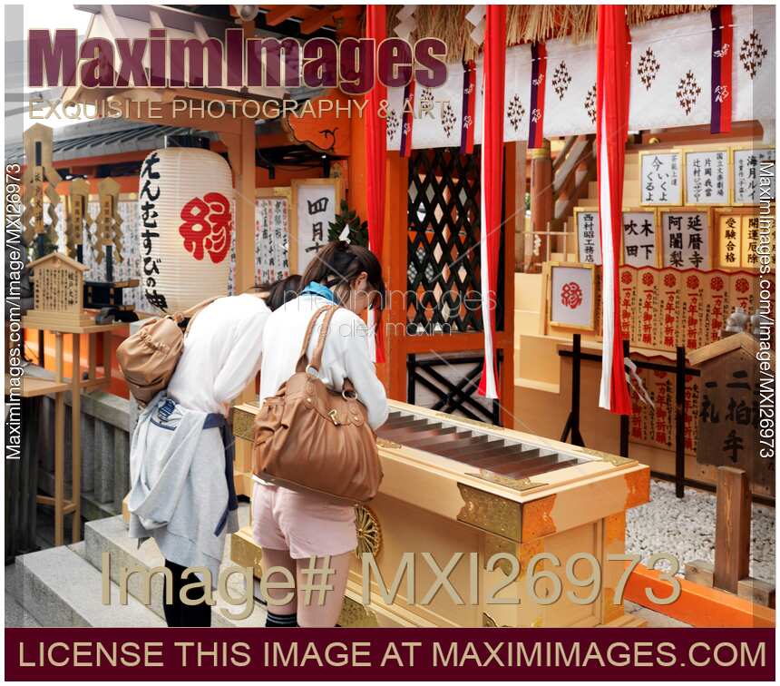 People at Jishu Jinja shrine of Kiyomizu-dera temple in Kyoto