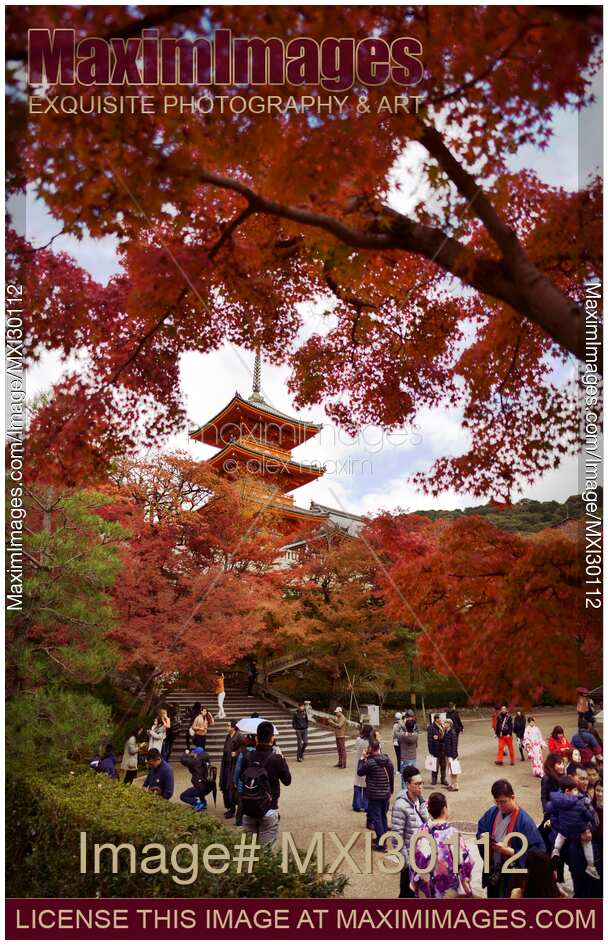 People at Kiyomizu-dera with Sanjunoto pagoda in autumn scenery