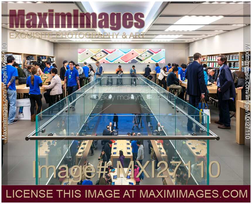 People at multi-storey Apple store in Tokyo