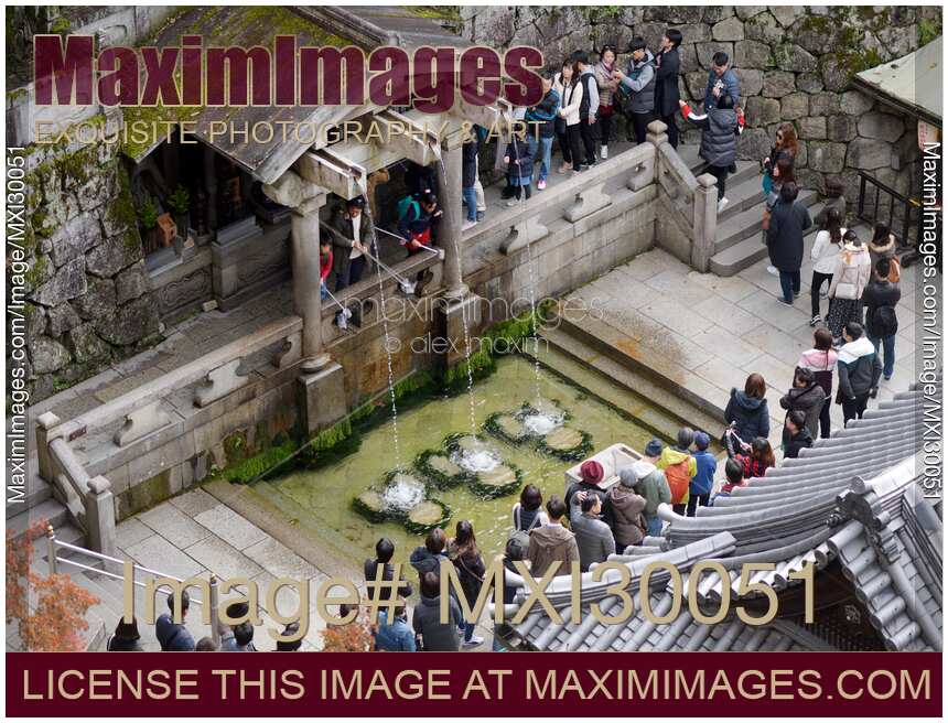 People at Otowa sacred waterfall in Kiyomizu-dera Otowa-no-taki Kyoto