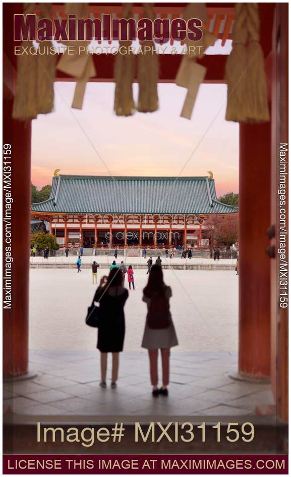 People at the main entrance gate Outen-mon of Heian Shinto Shrine