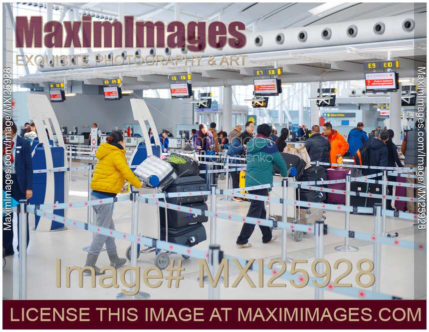 People checking in their baggage at airport