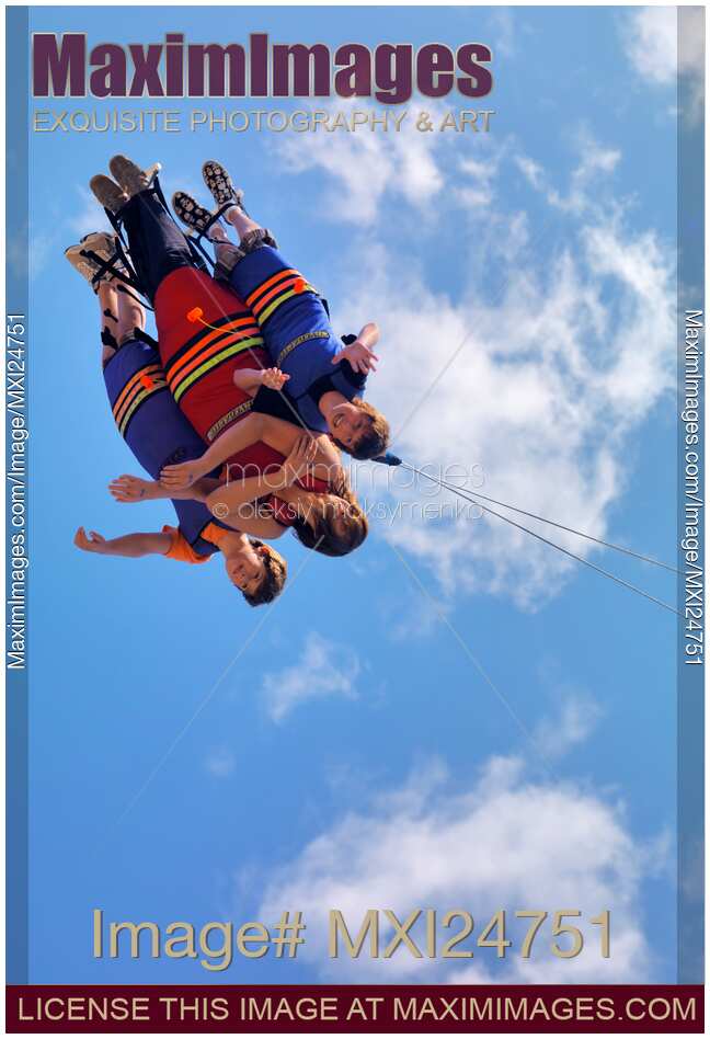 People Enjoying Free-Fall Swing
