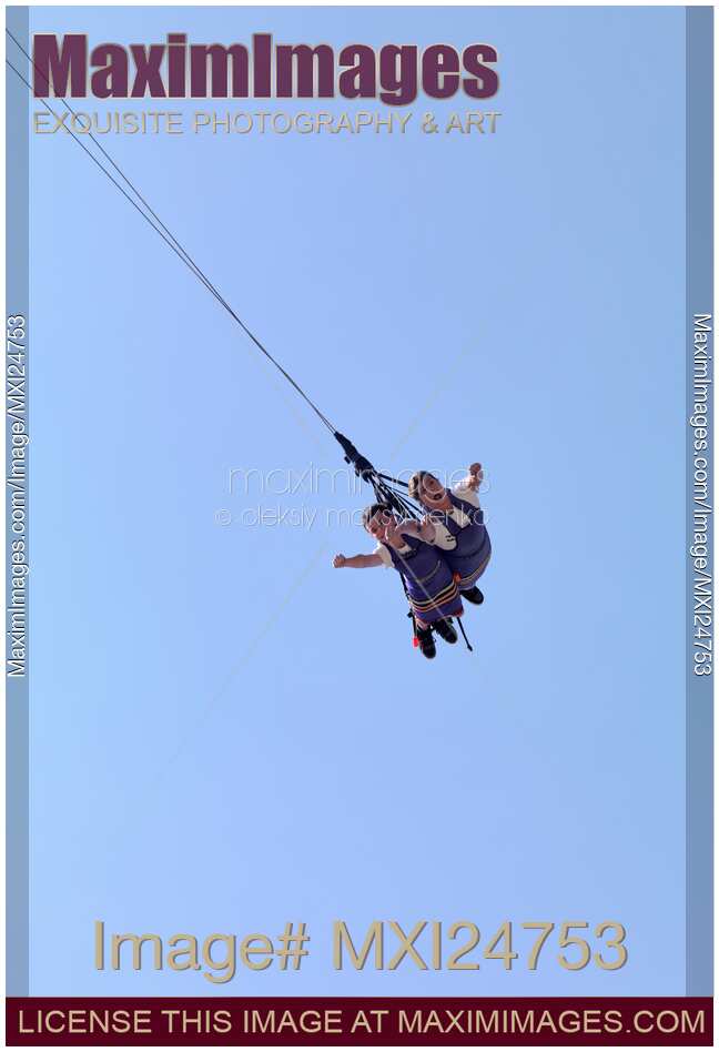People Enjoying Free-Fall Swing