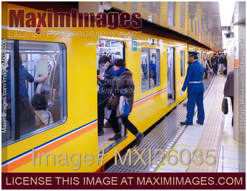 People entering subway train in Japan