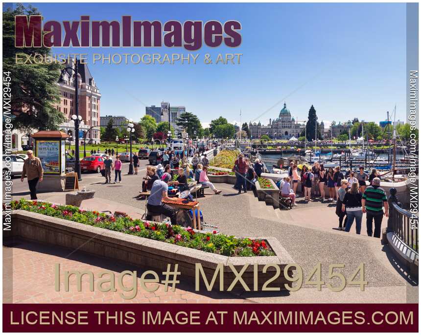 People in downtown Victoria BC by the harbour front