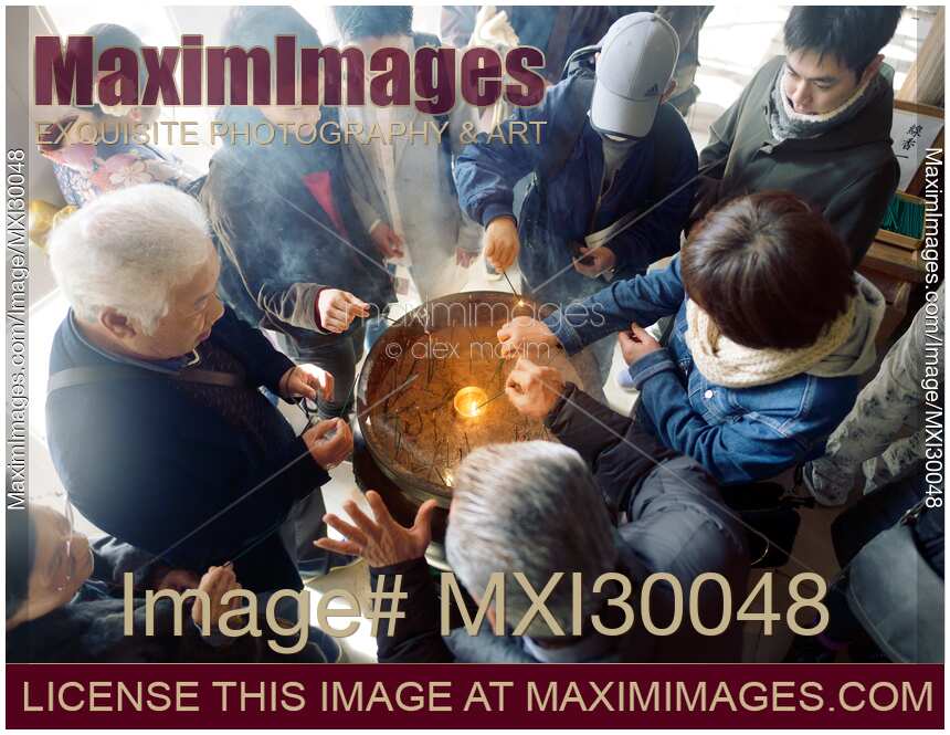 People incense at Kiyomizu-dera Buddhist temple in Kyoto Japan