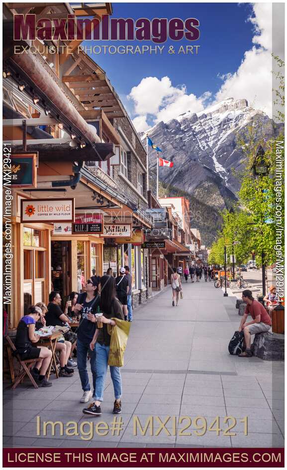 People on Banff Avenue street in downtown of Banff in Alberta Rockies