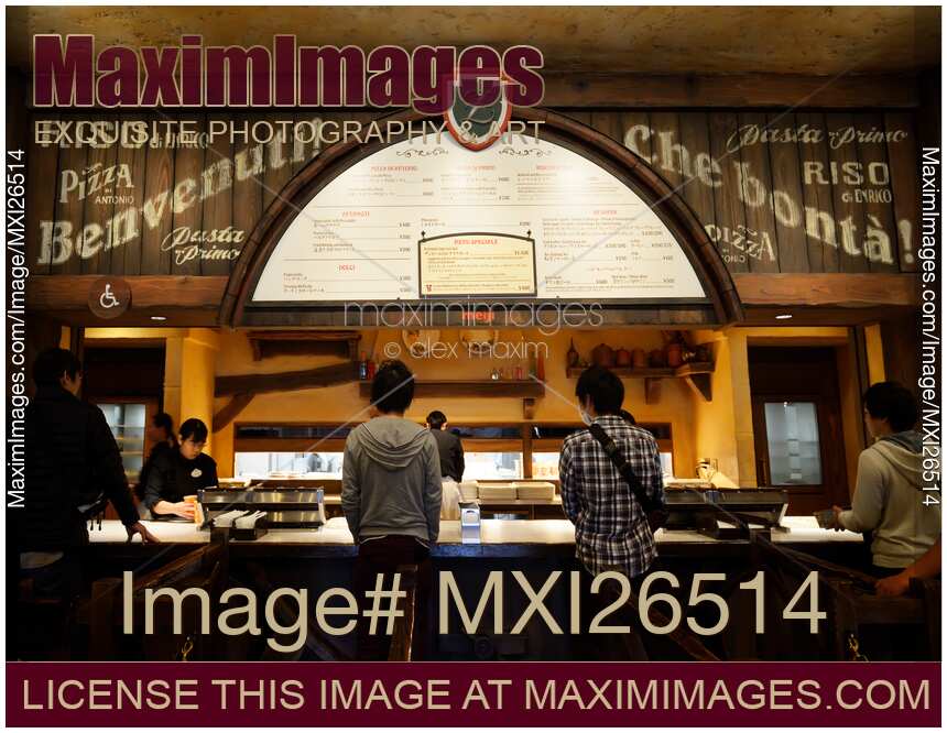 People ordering food in restaurant