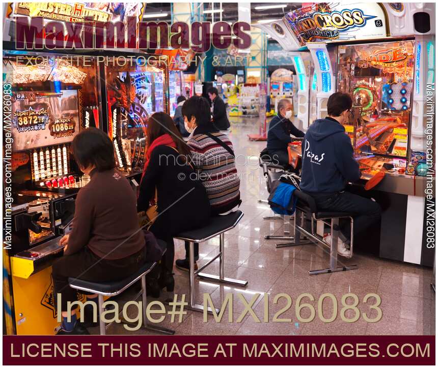 People playing at arcade in Odaiba Tokyo