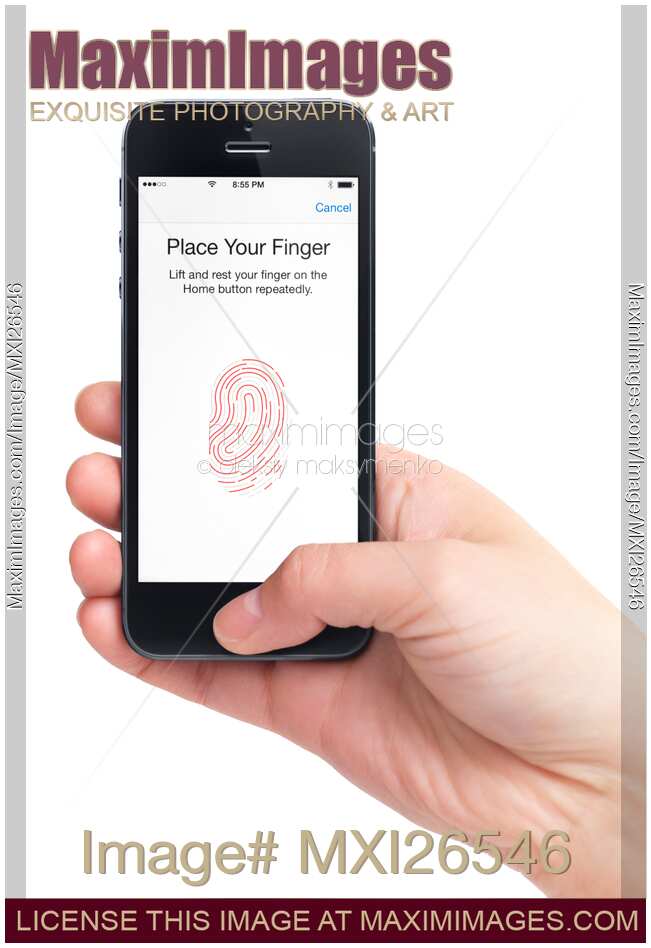 Person thumb on iPhone fingerprint sensor
