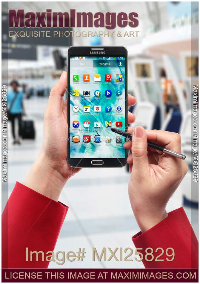 Person using Samsung smartphone at airport