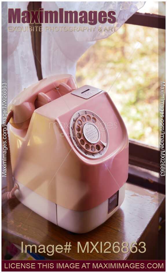 Pink vintage telephone