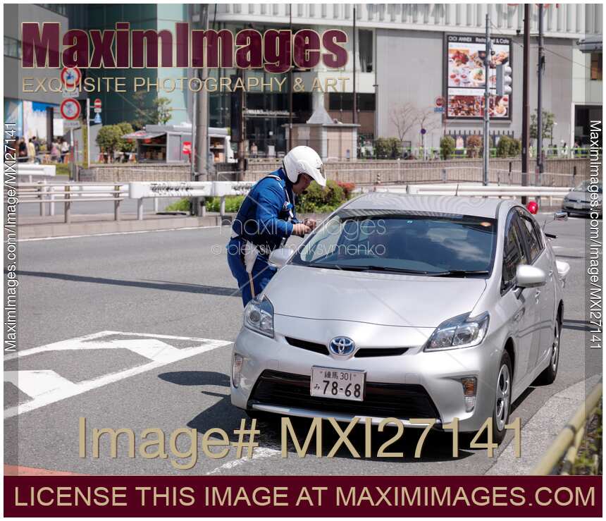 Police officer stopping a car