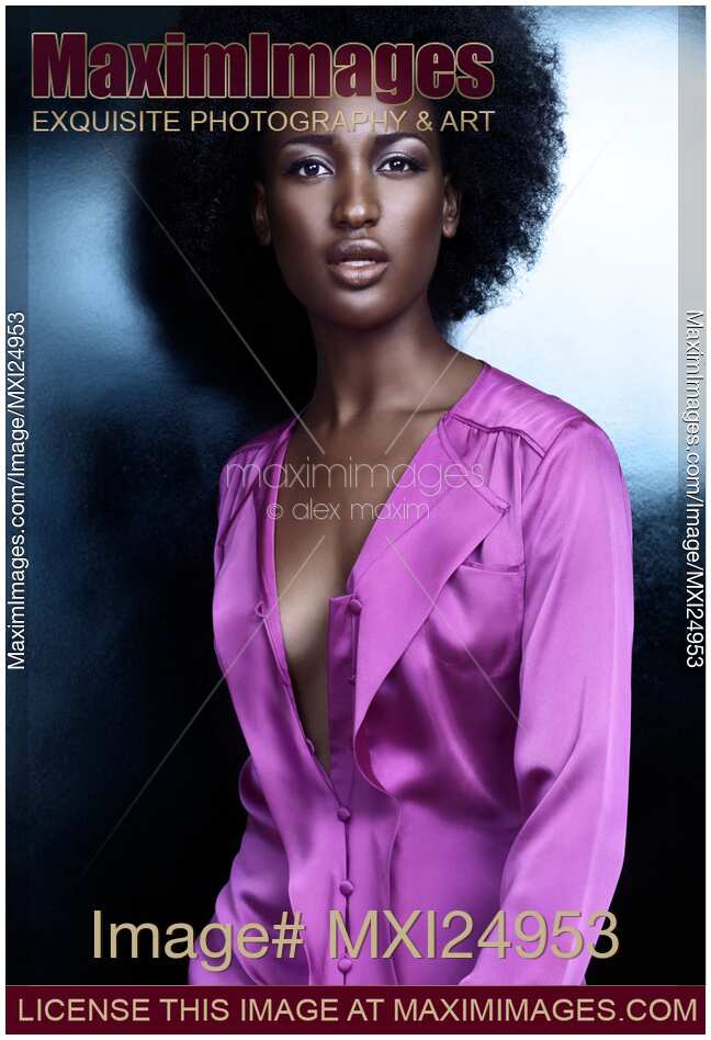 Portrait of a beautiful african american woman with shiny silvery skin