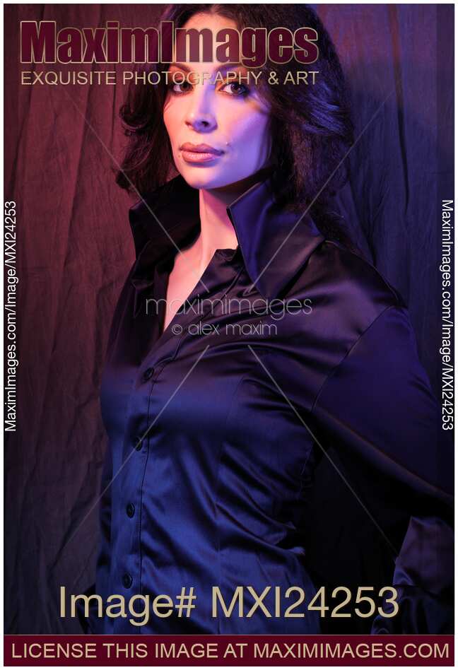 Portrait of a beautiful woman in black blouse