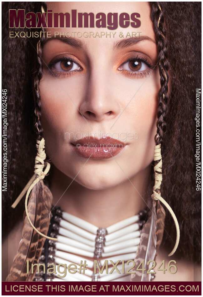 Portrait of a beautiful woman wearing aboriginal accessories