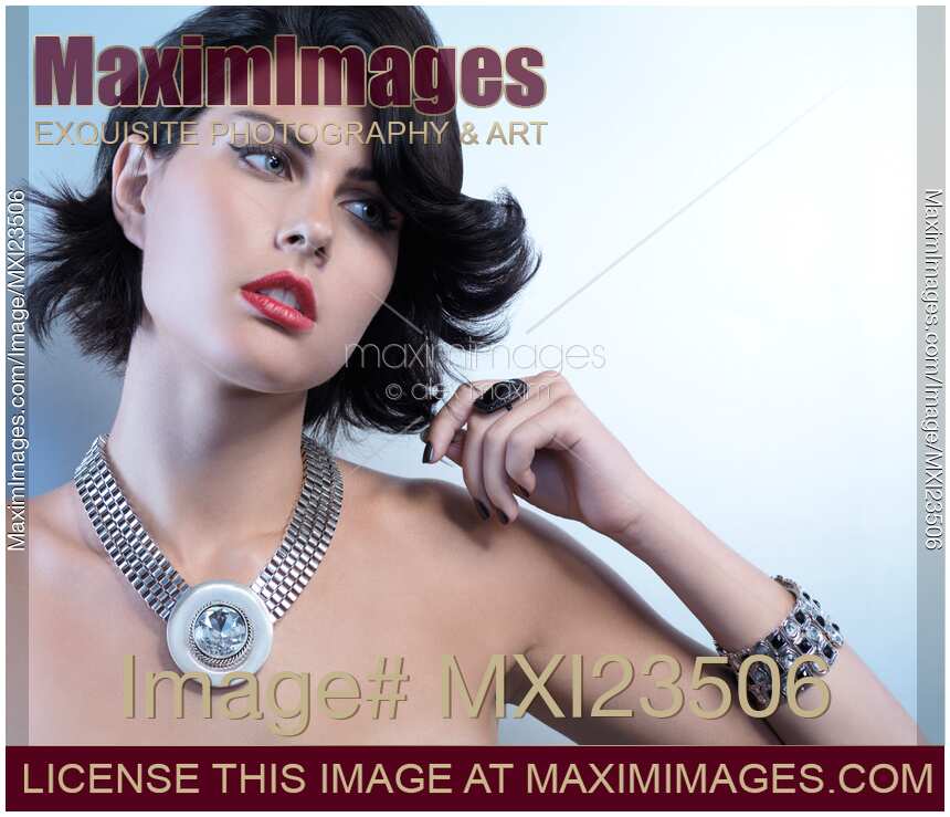 Portrait of a Beautiful Woman Wearing Jewellery