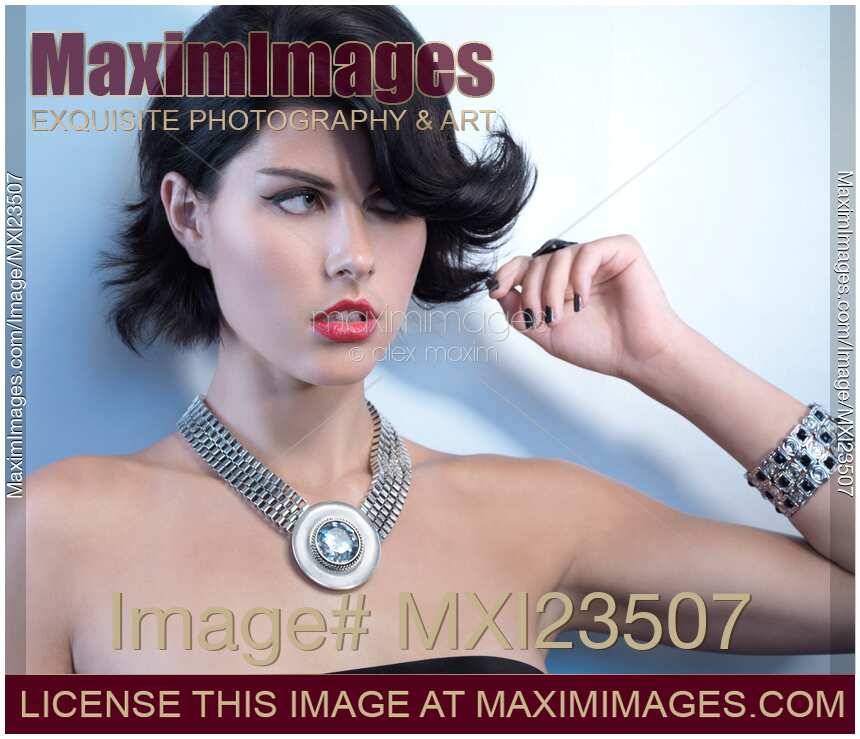 Portrait of a Beautiful Woman Wearing Jewellery
