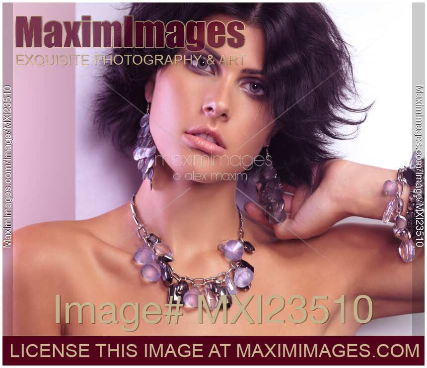 Portrait of a Beautiful Woman Wearing Jewellery