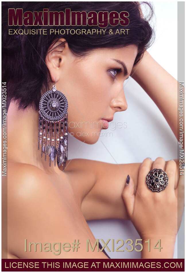 Portrait of a Beautiful Woman Wearing Jewellery