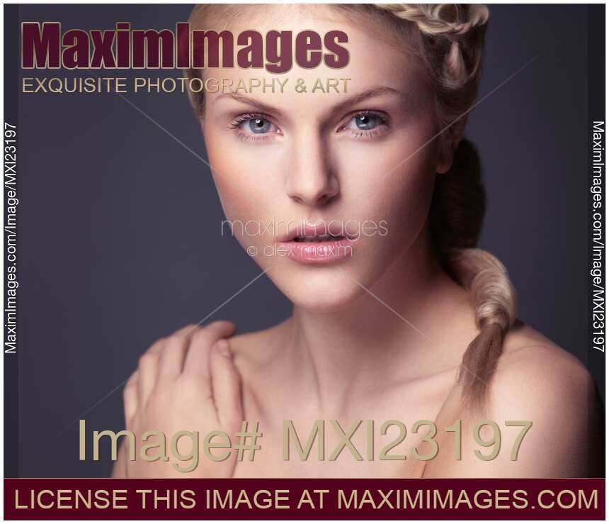 Portrait of a beautiful young woman looking at camera