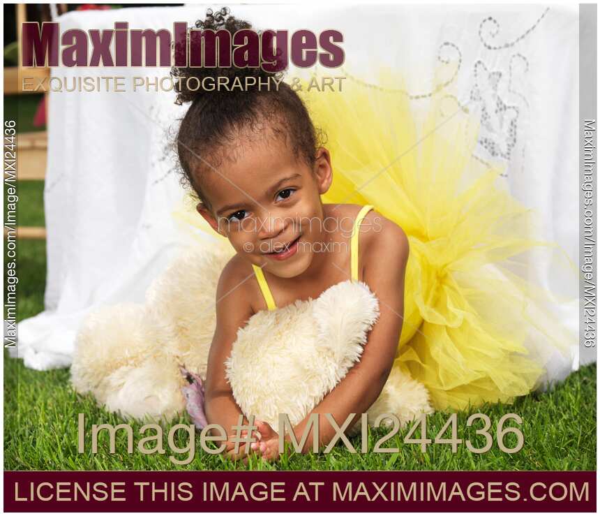 Portrait of a cute girl in tutu dress at a party