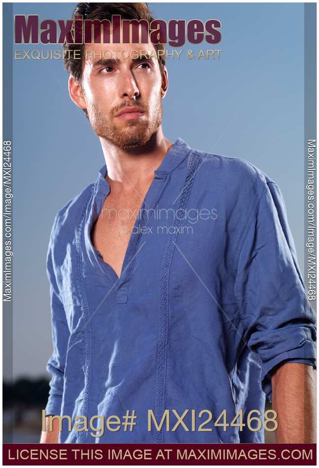 Portrait of a man in blue shirt