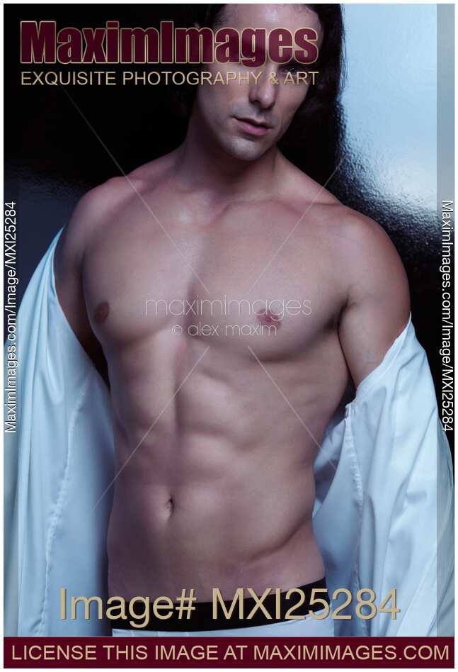 Portrait of a muscular sexy young man with bare torso