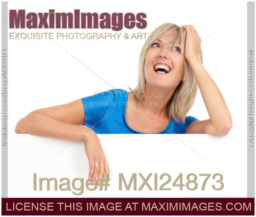 Portrait of a smiling young woman with daydreaming expression