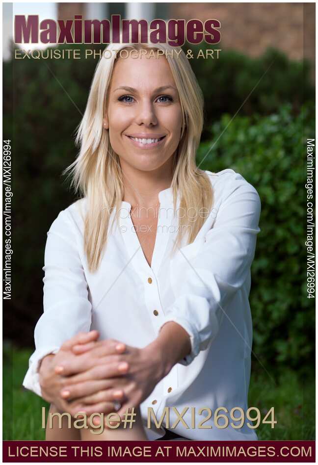 Portrait of a young smiling blond woman