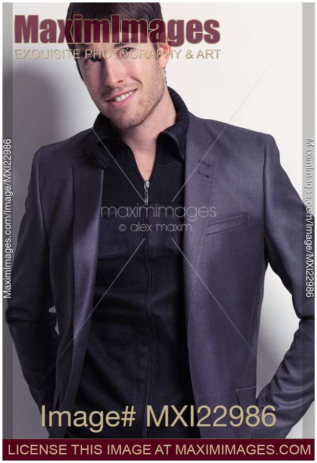 Portrait of a Young Smiling Man Wearing a Blazer