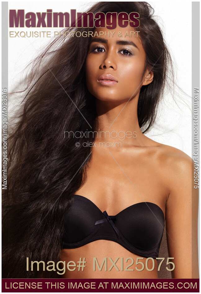 Portrait of a young woman with long hair