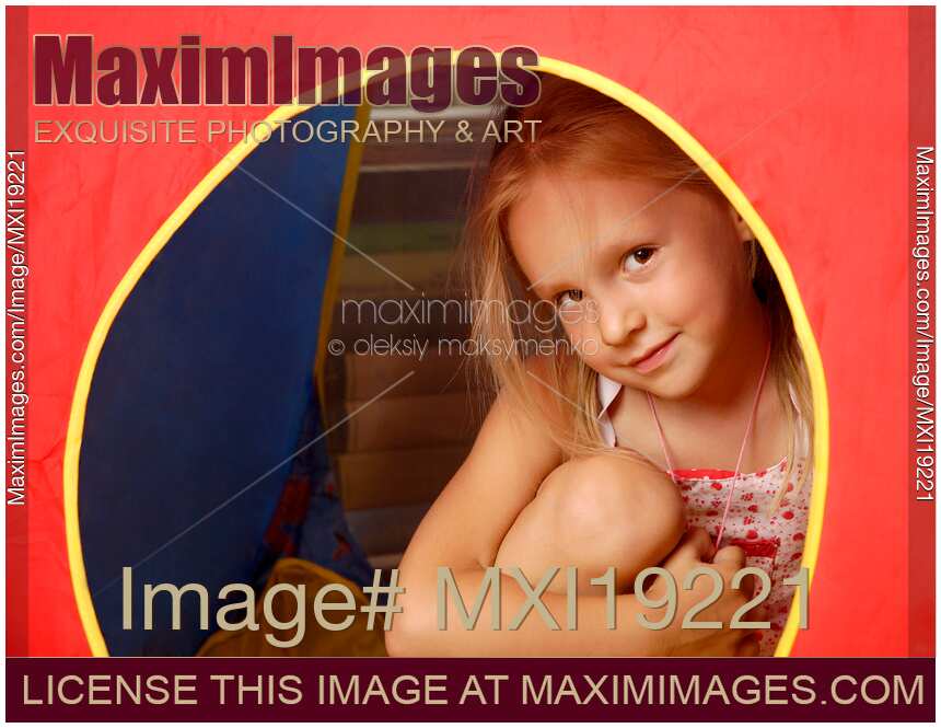 Portrait of little girl in her tent