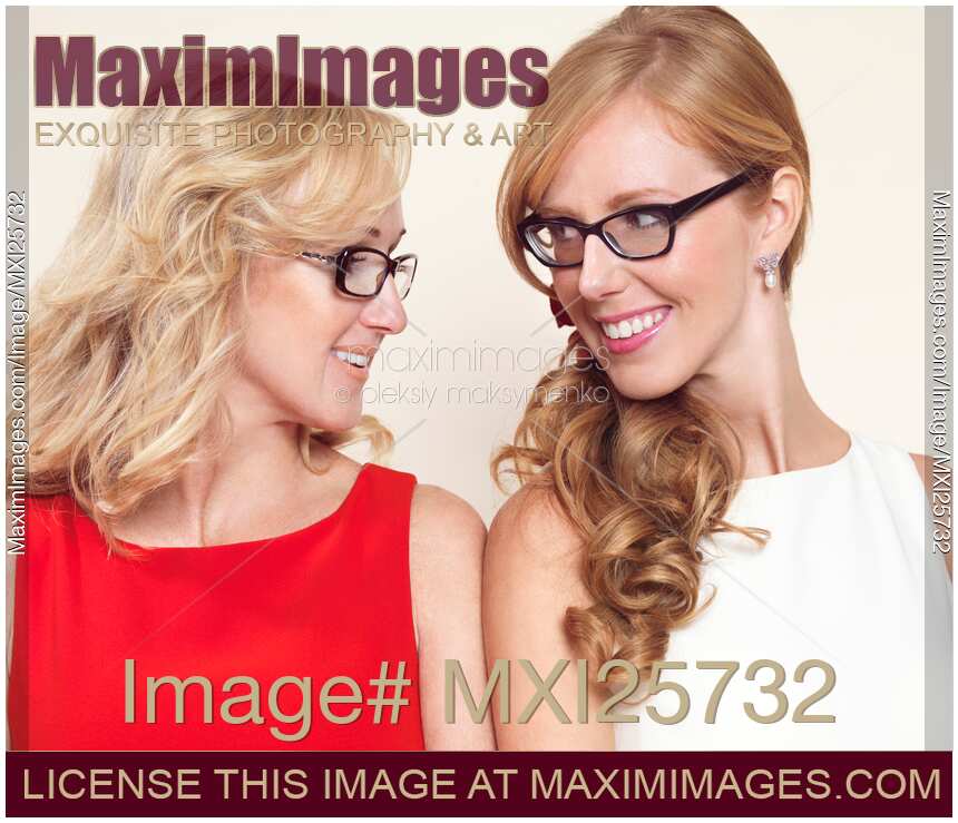 Portrait of two sisters wearing glasses