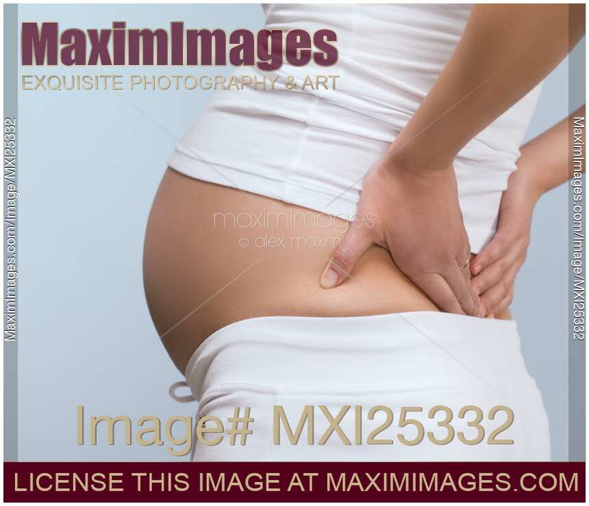 Pregnant woman experiencing backache