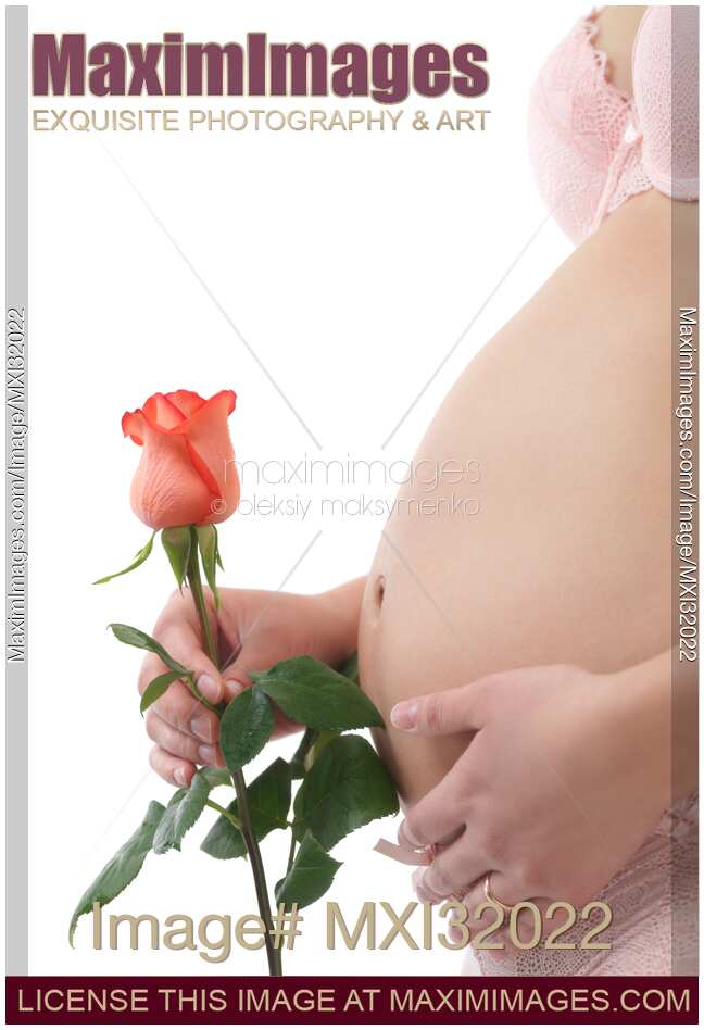 Pregnant Woman Holding a Red Rose