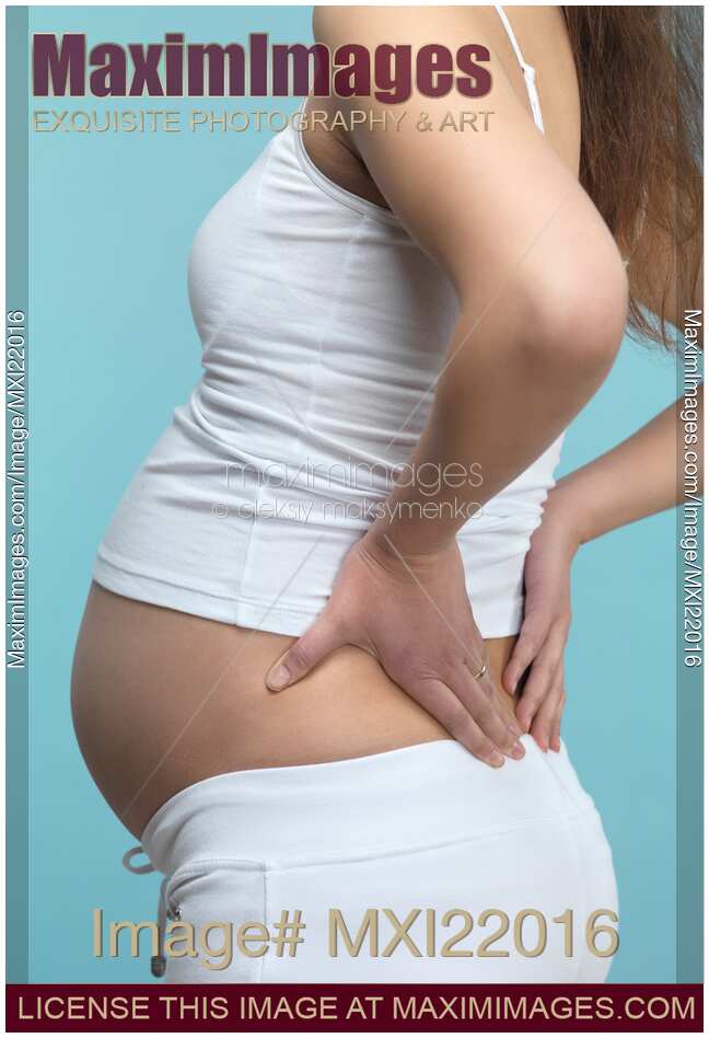 Pregnant Woman Rubbing Her Back