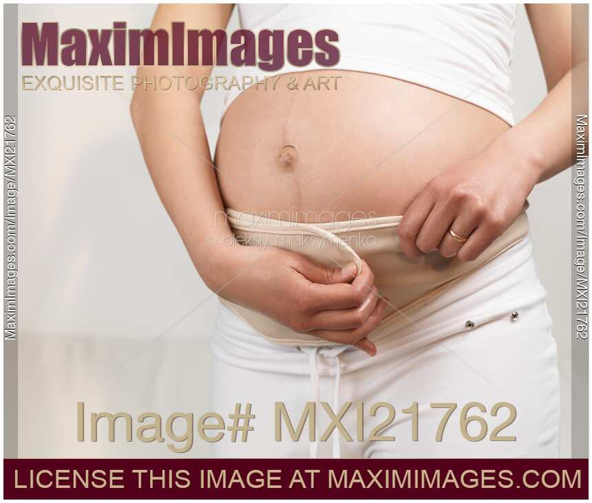 Pregnant Woman Wearing Pregnancy Belt