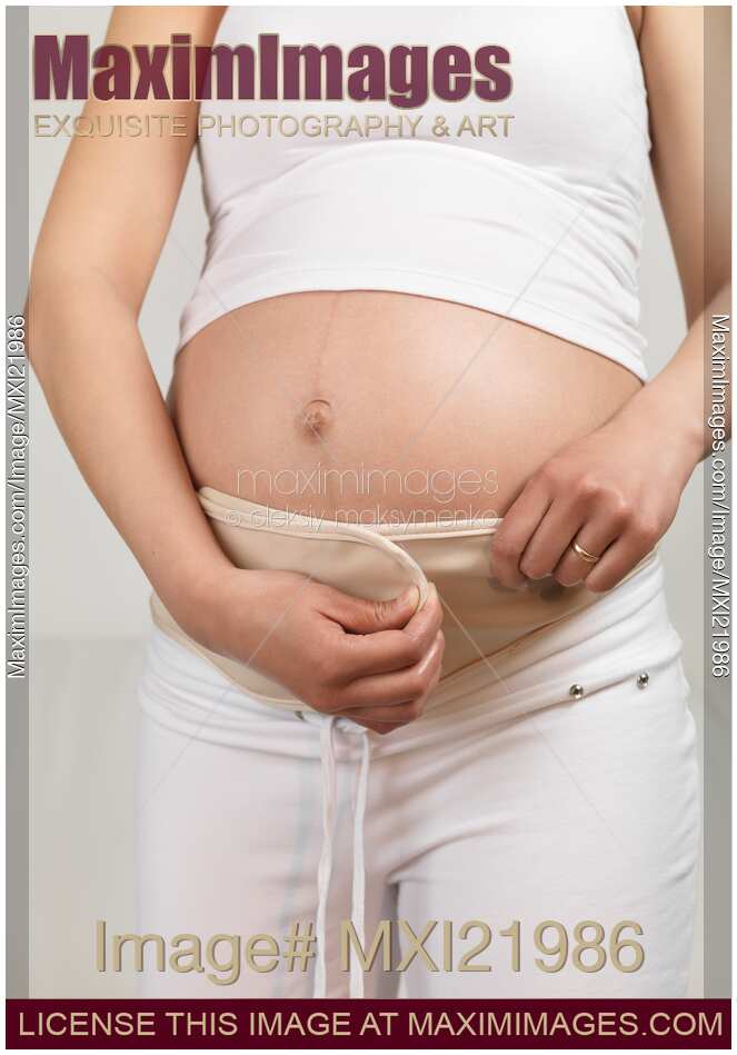 Pregnant Woman Wearing Pregnancy Belt