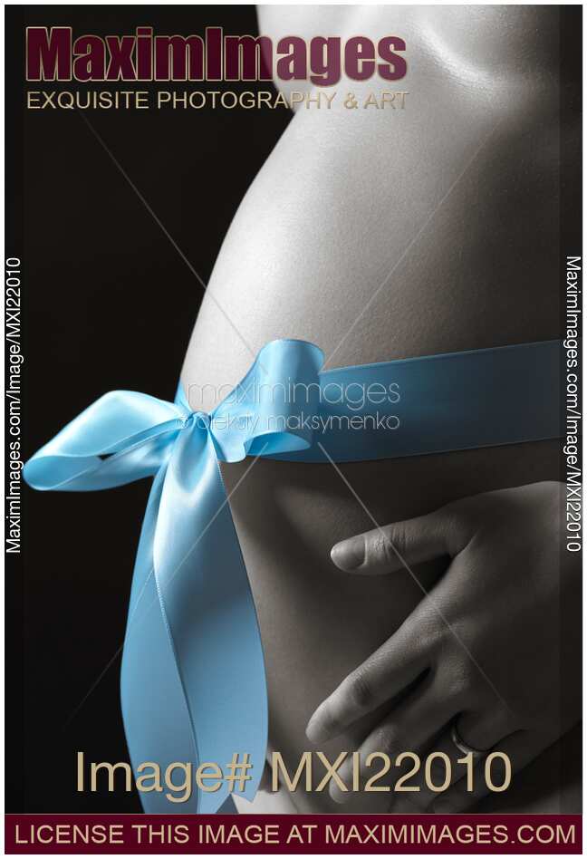 Pregnant Woman with a Bow on Her Belly