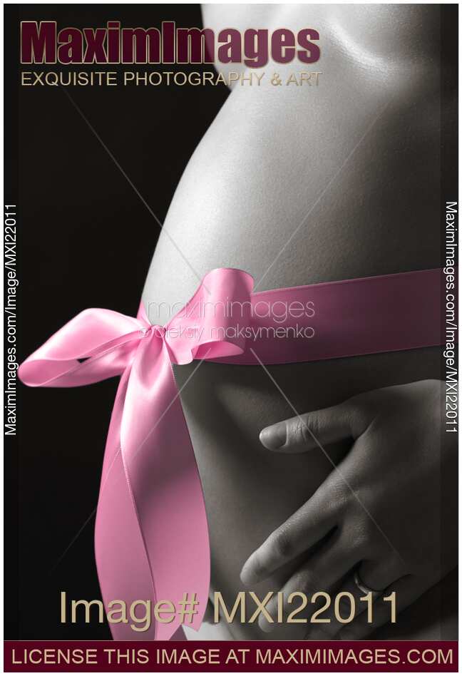 Pregnant Woman with a Bow on Her Belly