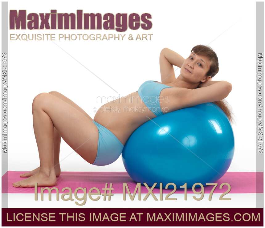 Pregnant Young Woman Doing Pilates Workout
