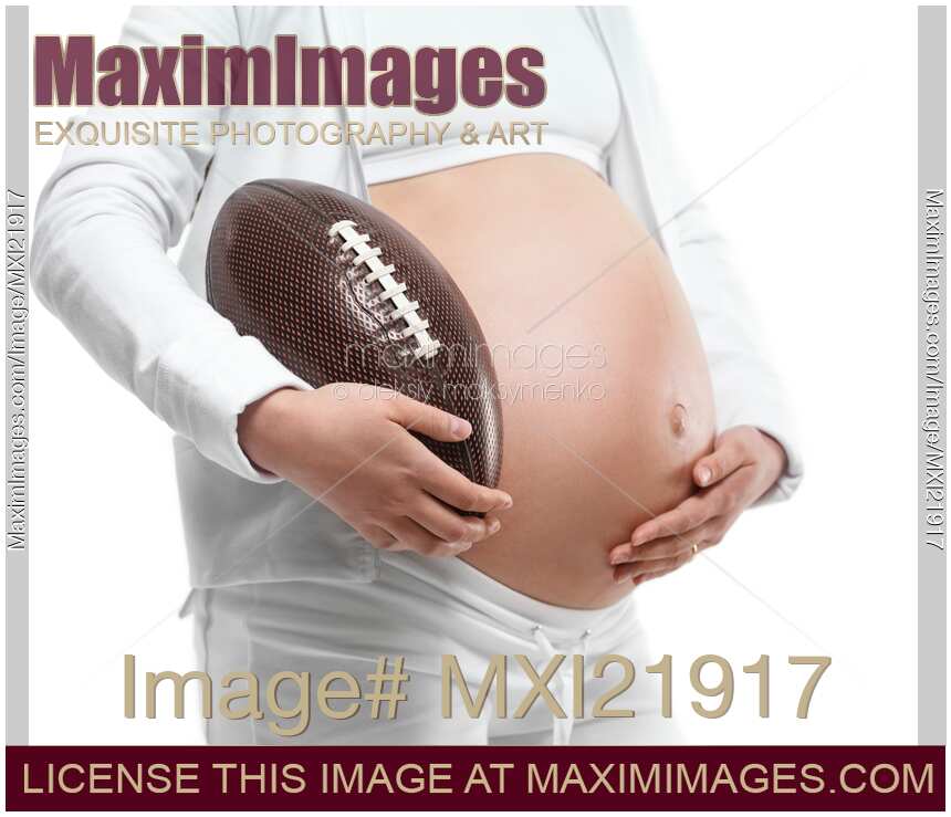 Pregnant Young Woman with a Football