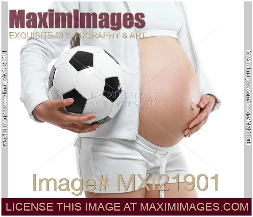 Pregnant Young Woman with a Soccer Ball