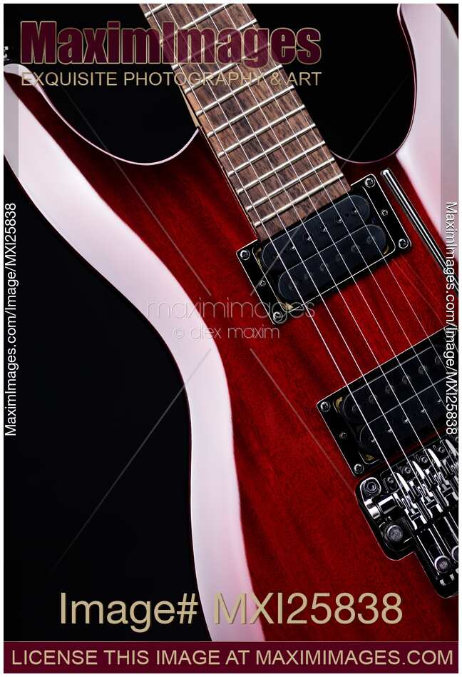 Red electric guitar closeup