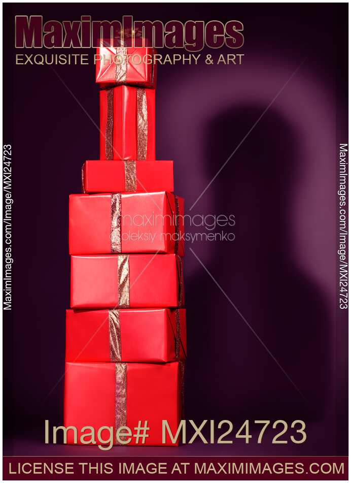 Red gift boxes stacked as a bottle