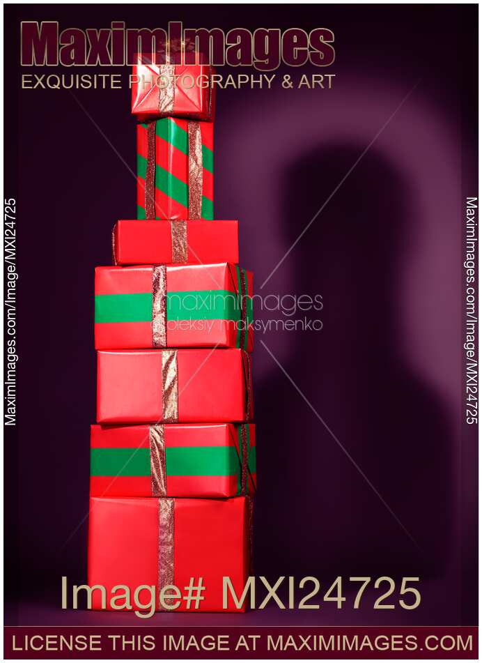 Red presents stacked in shape of bottle